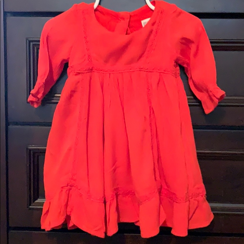 Beautiful orange red dress.